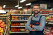 © PETR BABKIN - SUCCESSFUL CONFIDENT SMILING SUPERMARKET OWNER IN THE SALES AREA AMONG THE PRODUCTS FOR SALE. HORIZONTAL IMAGE. image created by legal AI