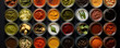 chutney set or collection in bowls on black background, top view,