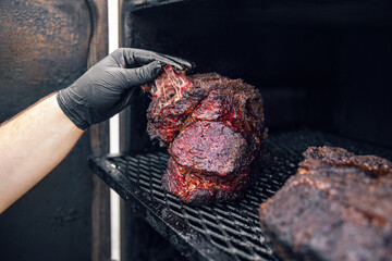 Canvas Print - Meat grilling on the smoker