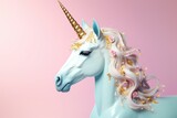 Fototapeta  - A majestic unicorn sculpture with a shimmering gold horn