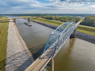 Wall Mural - towboats with barges on Chain of Rock Canal of Mississipi River above St Louis, aerial view in October scenery