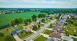 Aerial rural neighborhood with farmland between neighborhoods