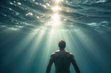 Generative AI Illustration Of Man Glides Underwater, Sunlight Piercing Through The Surface, Creating Radiant Beams Around Her