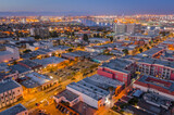 Fototapeta Miasto - Aerial view of Downtown San Pedro facing Vincent Thomas Bridge and Long Beach at Twilight