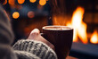 A person relaxing by a cozy fireplace with a mug of warm hot chocolate on a winter evening