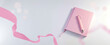 © sizsus - empty blank pink notebook with a pen mockup with copy space for stationery and personal diary and girls school homework studies concepts