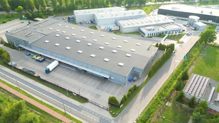 Sticker - Aerial drone view on distribution center. Logistic and transport concept
