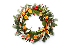 A Nature Inspired Holiday Wreath Showcases Vibrant Dried Oranges Aromatic Star Anise And Pine Branches Against On White Backdrop. Winter Christmas Concept