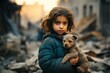 Child of war on the ruins of a destroyed city. The concept of civilians affected by bombing. Humanitarian catastrophe
