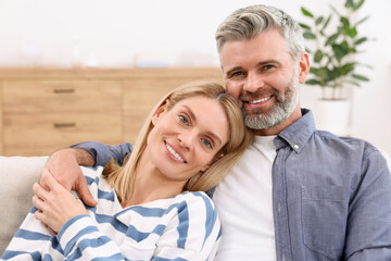 Wall Mural - Portrait of happy affectionate couple at home. Romantic date