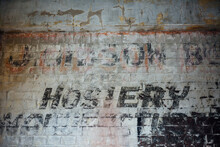 Ghost Signage On Brick Wall