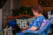 © Austockphoto - Grandmother using laptop to video call her grandchildren and stay connected