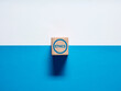 The word Ethics on wooden cubes on blue and white background. Business ethics, ethical corporate culture, business integrity and moral principles
