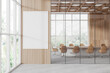 Beige and wooden board room with poster