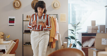 Poster - Woman, tablet and fashion of small business owner in logistics, research or communication at boutique. Female person or employee on technology for online search, supply chain or order at retail store