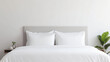 Comfortable double bed white bed sheets and pillows