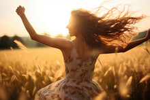 Young Woman Feeling Relieved In Beautiful Nature, Enjoying The Summer, Dancing With Opened Arms On The Wind