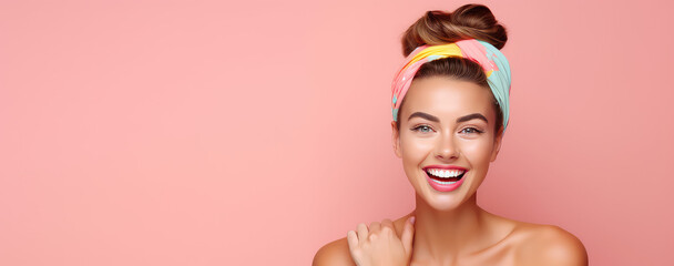 Wall Mural - Young beautiful smiling woman in trendy headband on head isolated on flat color background with copy space. 