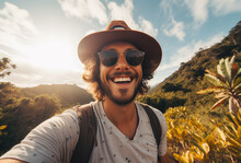 A Stylish Man Smiles Confidently As He Embraces The Great Outdoors, Sporting A Trendy Sun Hat And Sunglasses While Surrounded By The Beauty Of Nature And The Clear Blue Sky