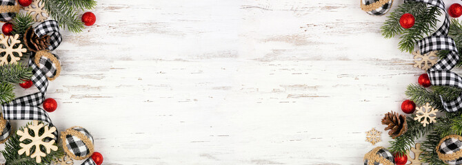 Aufkleber - Christmas double border of white and black gingham ribbon, baubles and branches. Top view on a white wood banner background. Copy space.
