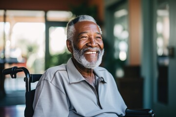 Wall Mural - Portrait of a happy senior man in a wheelchair at the nursing home