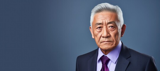 Canvas Print - Mature Asian businessman serious face portrait