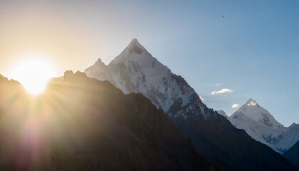 Wall Mural - panoramic view of beautiful snowy masherbrum peak in karakoram mountain range during sunset light