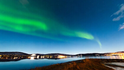 aurora borealis reflected between two fjords in tromso