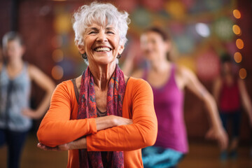 Portrait of a happy senior woman taking park in a yoga or fitness class