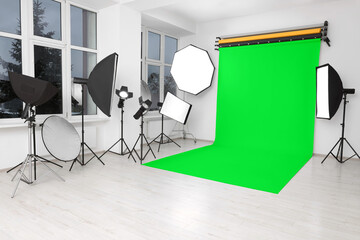 Poster - Chroma key compositing. Green backdrop and equipment in studio