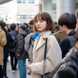 asian girl in a group of people