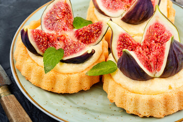 Wall Mural - Delicious mini tartlet with figs.