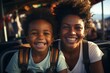 Close-up portrait of a beautiful woman and her son riding an amusement park ride. Cheerful, smiling mother and boy relaxing and enjoying time. Shared leisure and entertainment strengthens family ties.