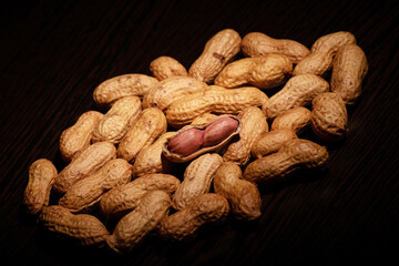 Wall Mural - Roasted peanuts on the table