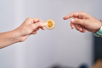 Canvas Print - Young blonde woman giving bitcoin at office