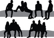 Black silhouettes of a people sitting	
