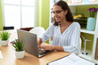 © Krakenimages.com - Young african american woman business worker using laptop working at office
