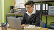© Krakenimages.com - Young beautiful hispanic woman business worker using laptop working at office