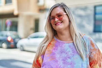 Sticker - Young woman smiling confident wearing heart sunglasses at street