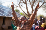 Solar panels installed in African villages to provide electricity in impoverished areas, happiness of citizens