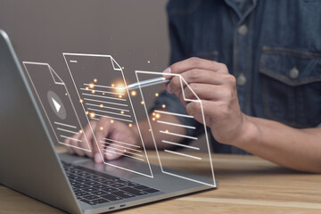 Document Management System (DMS). Artificial Intelligence (Ai) Man working edit virtual Paperless screen with computer laptop. File sharing network. Manage database. Searching report