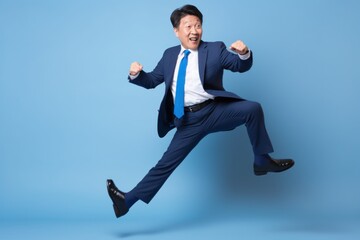 Canvas Print - Asian businessman dancing excited happy