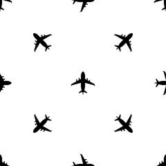 Poster - Seamless pattern of repeated black airplane symbols. Elements are evenly spaced and some are rotated. Vector illustration on white background