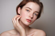 © Rudsaphon - Close-up portrait of beautiful young woman with clean fresh skin, natural make-up. Studio shot.