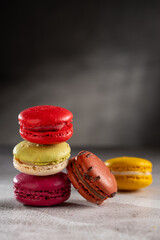 Canvas Print - Delicious macaroons on the table. Macarons cakes in different colors.