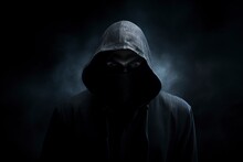 Hooded Man On Dark Background