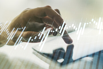 Poster - Multi exposure of abstract financial diagram and hand working with a digital tablet on background, banking and accounting concept