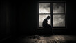 A monochrome picture showing a lonely person ruminating musingly by a window.