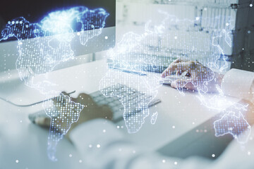 Fototapete - Abstract creative digital world map and hands typing on laptop on background, globalization concept. Multiexposure