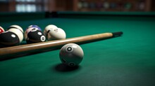 Freshly chalked billiards cues resting against a green-felt pool table.
